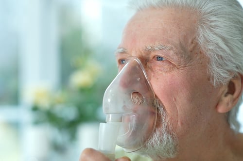 close-up-portrait-ill-senior-man-portrait-with-inhaler