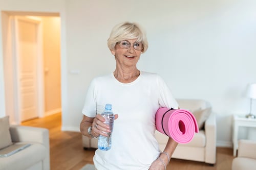 mature-woman-getting-ready-workout-elderly-woman-ready-working-out-refreshment-after-training-sporty-old-woman-drinking-water-1
