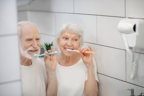 morning-procedures-elderly-couple-brushing-their-teeth-together-feeling-good