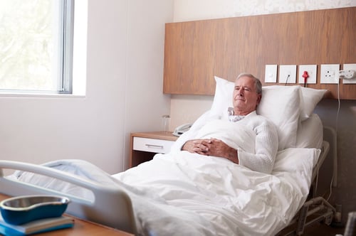 senior-male-patient-hospital-bed-geriatric-unit