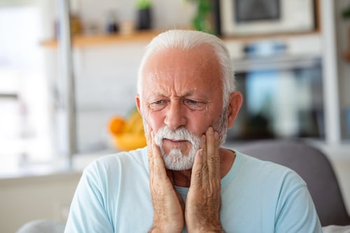 tooth-pain-dentistry-senior-man-suffering-from-terrible-strong-teeth-pain-touching-cheek-with-hand-feeling-painful-toothache-dental-care-health-concept